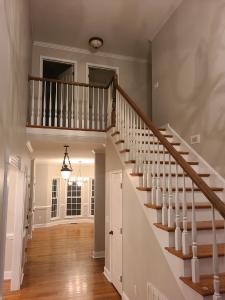 painting contractor Clemson before and after photo 1614713535447_stairhall